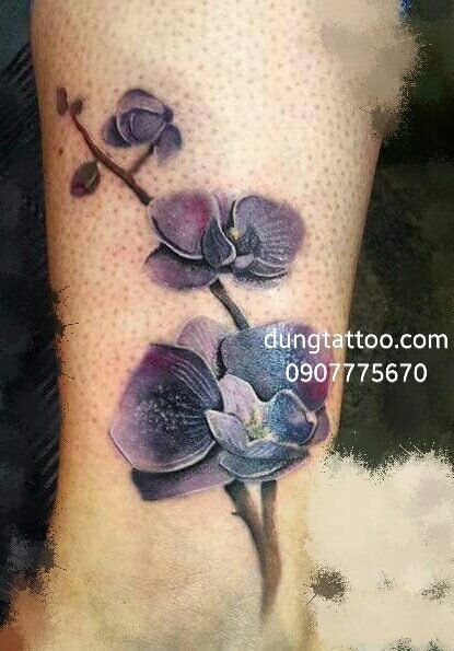 Xăm hoa lan lấp sẹo phỏng 2 cái trên chân Dũng thực hiện 0907775670