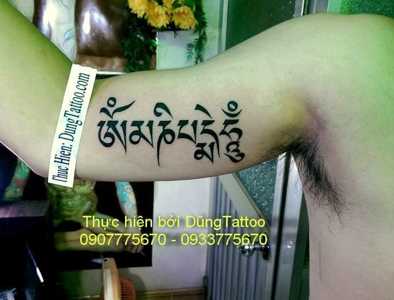 Hình xăm chữ om ma ni pad me hum -thực hiện tại dũng 0907775670